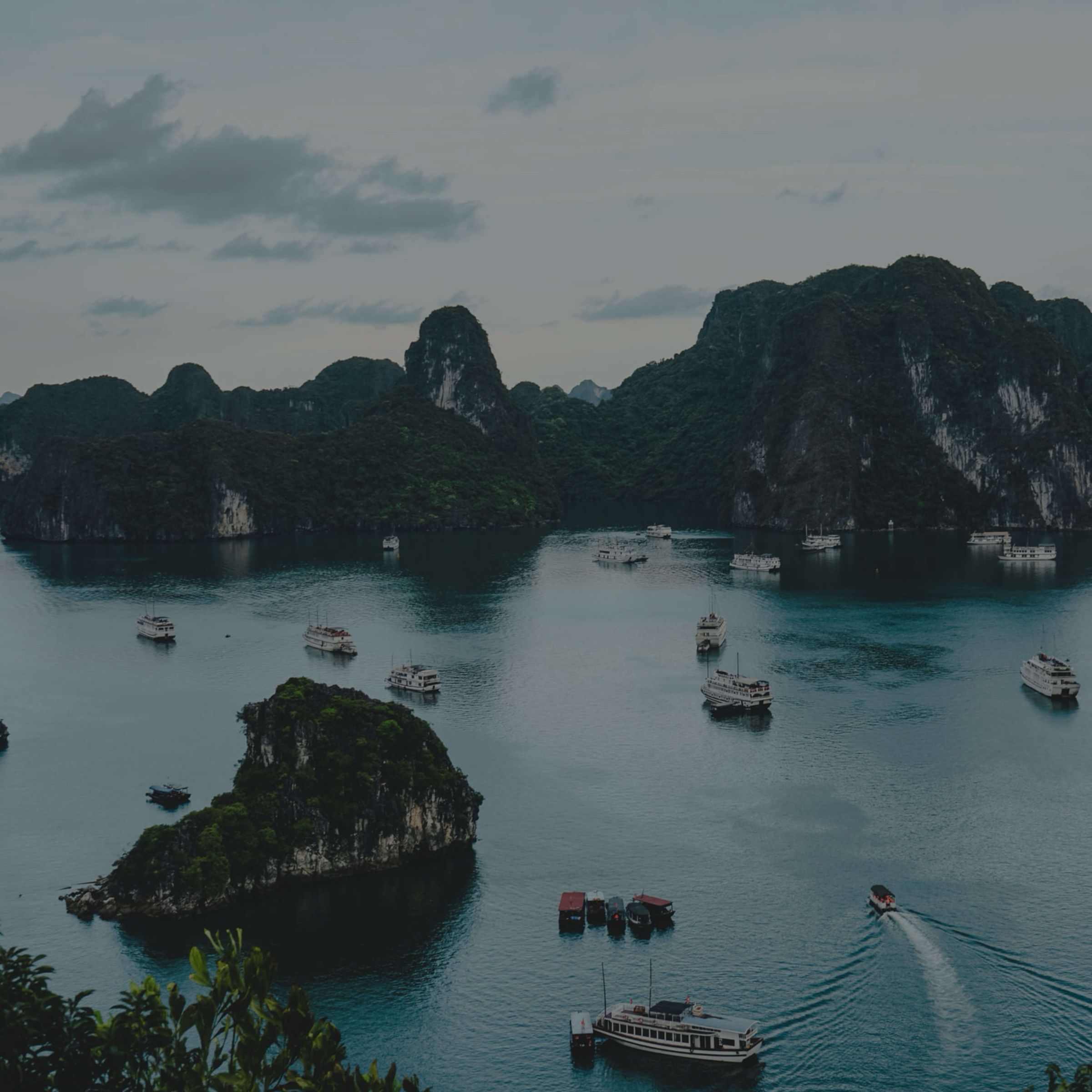 Boats among the limestone islands of Ha Long Bay, Vietnam