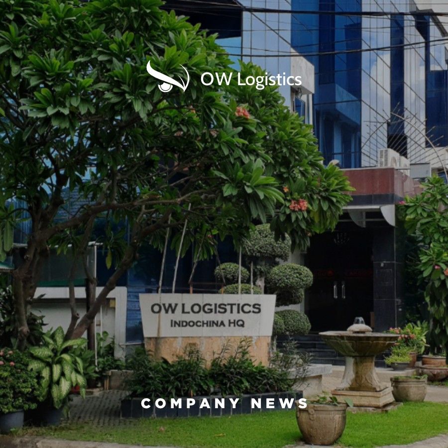 The OW Logistics Indochina HQ building sign among tropical plants